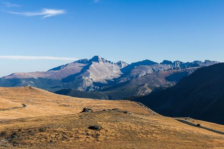 Trail Ridge Road in Rocky Mountain National Park gives a view of Neníisótoyóú’u (Longs Peak) in Colorado, left of center.