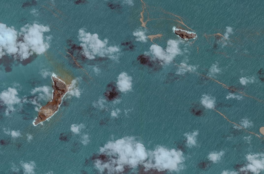 Satellite image of multiple small volcanic islands after eruption