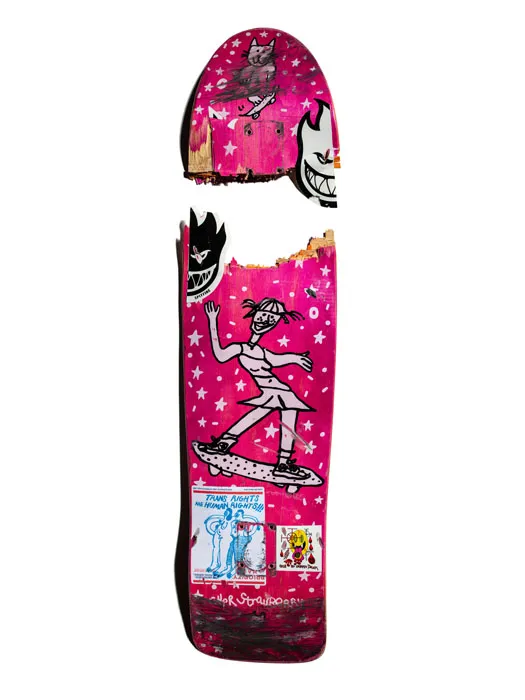 Broken pink skateboard