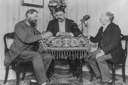 An 1889 photograph of author Horatio Alger (right)