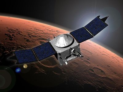 An artist's concept of NASA's Mars Atmosphere and Volatile Evolution (MAVEN) mission at Mars.