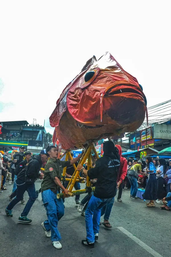 Carrying a Giant Fish thumbnail