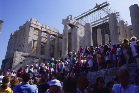 Crowds gather outside the front gate of the Acropolis.