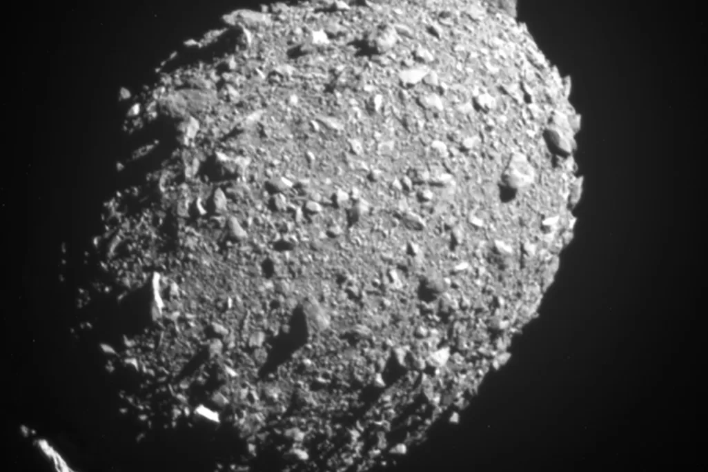 a space rock with lots of little boulders on it