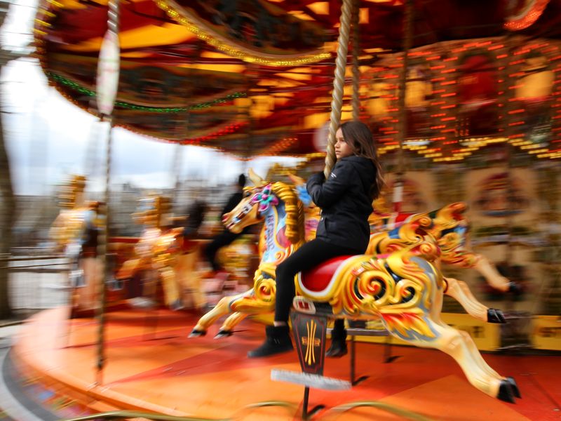 A young girl enjoying the carousel | Smithsonian Photo Contest ...