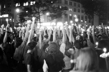 A candlelight vigil is tinged with a sense of resistance and resilience as activists honor the second anniversary of Stonewall, 1971.