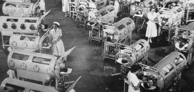 Polio patients in iron lungs in 1952
