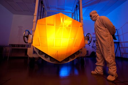 A thin layer of gold on each of the James Webb Space Telescope’s 18 mirror segments reflects mostly infrared light. 