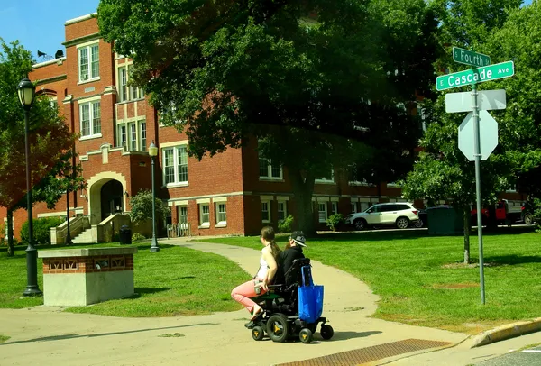 Traveling Together on a Mobility Scooter thumbnail