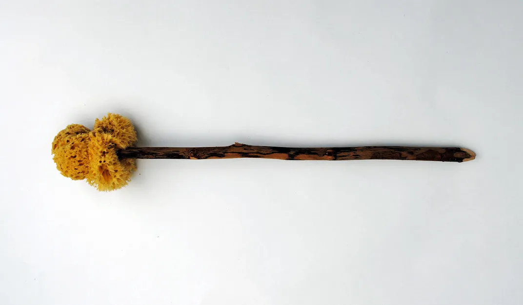 A replica tersorium, or sponge attached to a stick
