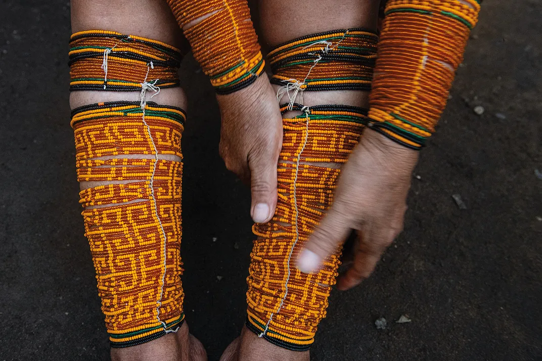 Gladis Arosemena Caicedo de Crespo adorns her legs with traditional beads. In Guna, the beads are called “wini” and in Spanish, “chaquira.”