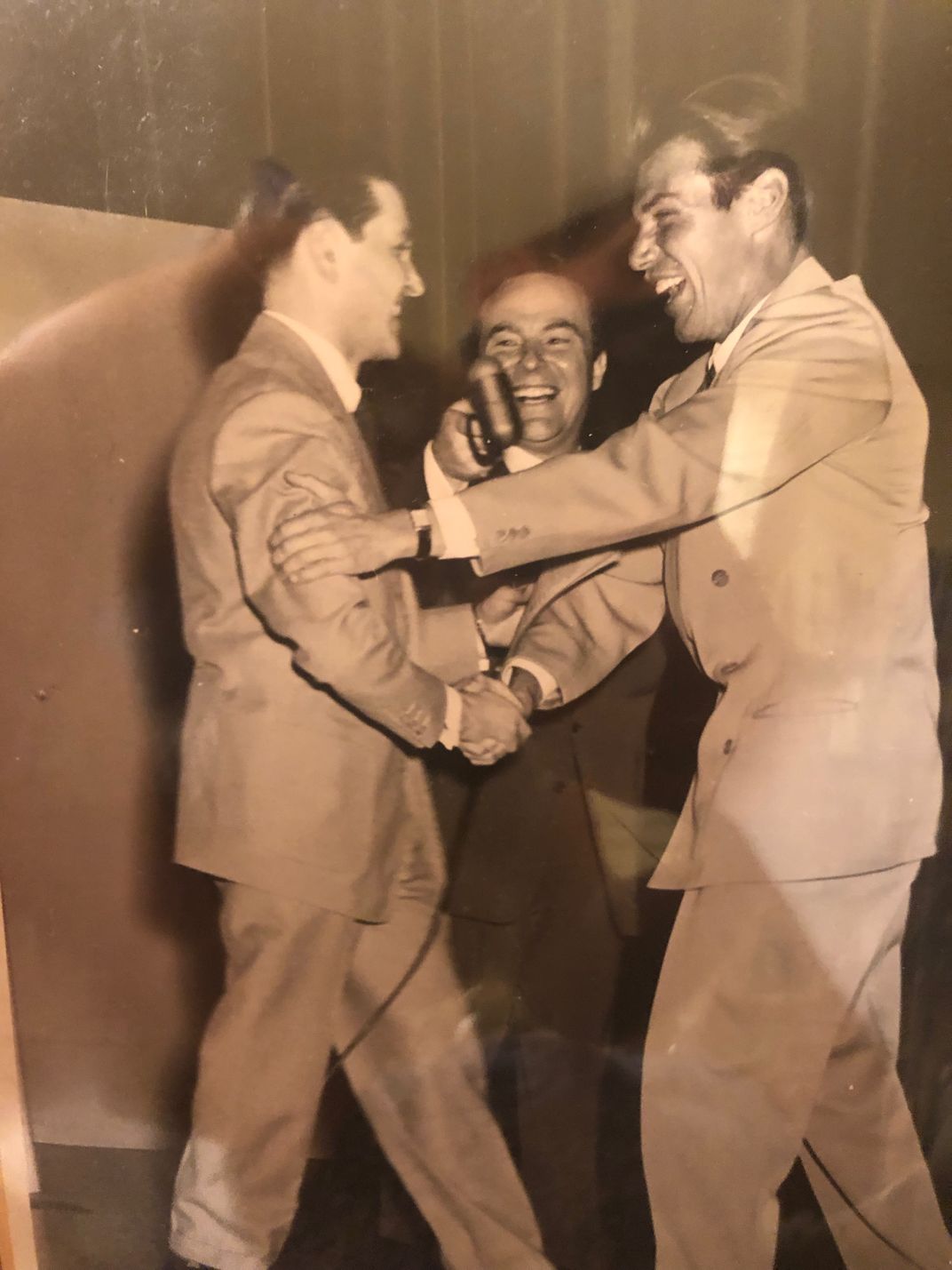 Simon (left) and Ortiz reunite for the first time since World War II on the set of NBC radio show "This Is Your Life" in November 1949.