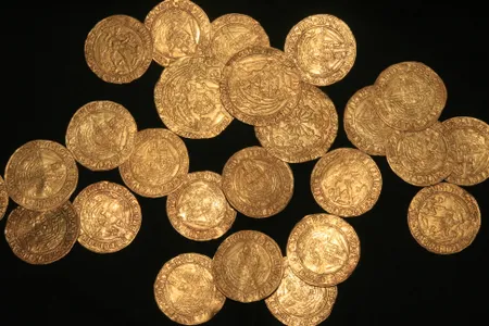 A family in southern England found the trove of 64 coins while gardening.