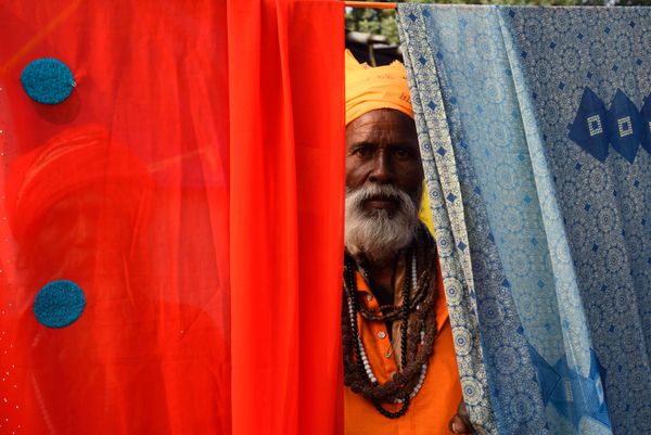 SADHU PEEPING THROUGH, CAMERA: NIKON D750, f/6.3 S/250, LENS: 18-35MM NIKON LENS thumbnail