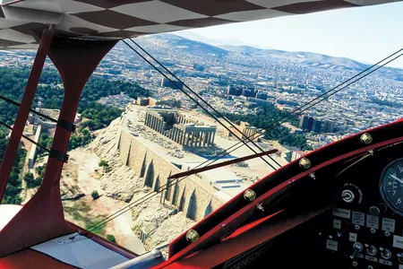 If you can’t visit Greece, bring Greece to you. With the latest version of  Microsoft Flight Simulator, the Acropolis is one of many photorealistic marvels you can visit from the comfort of your home—while flying a simulated Pitts Special biplane.