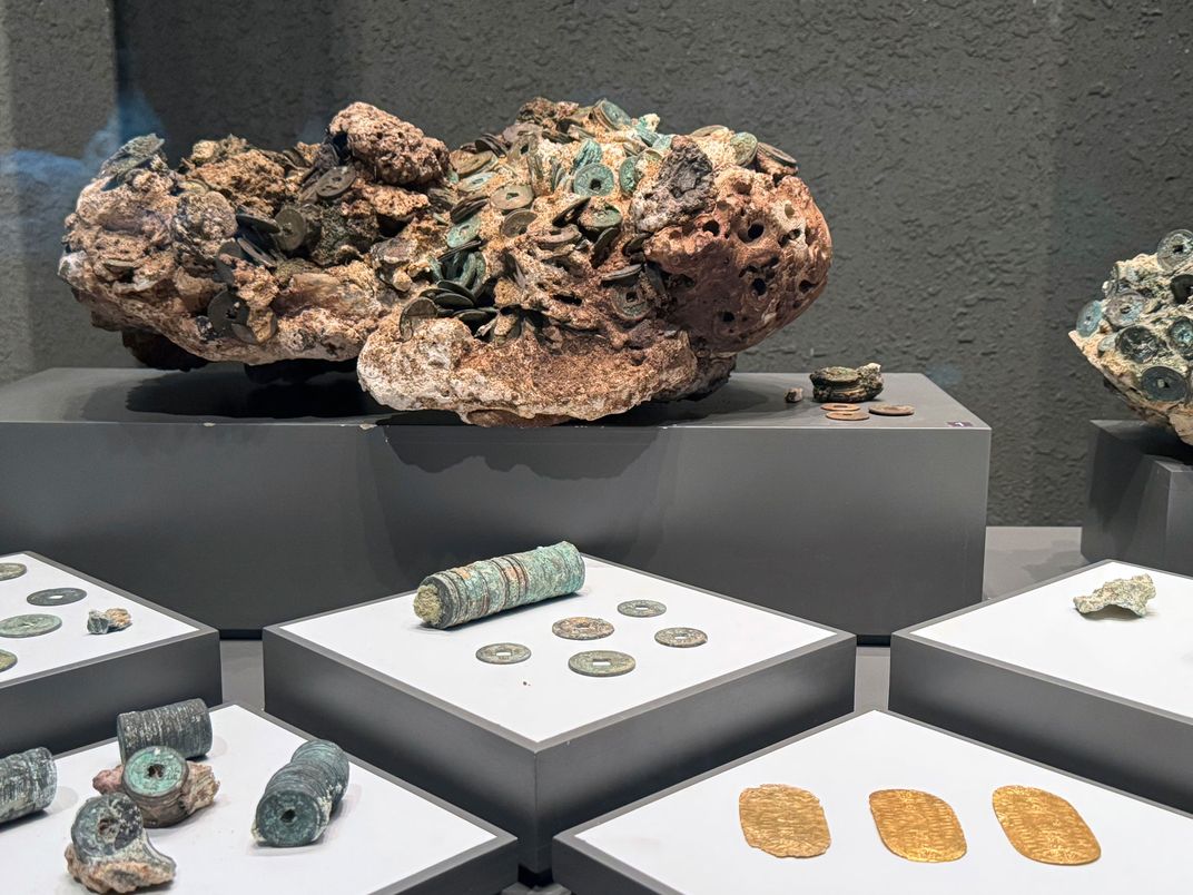 Copper, silver and gold coins recovered from shipwrecks in China for display at the China (Hainan) Museum of the South China Sea