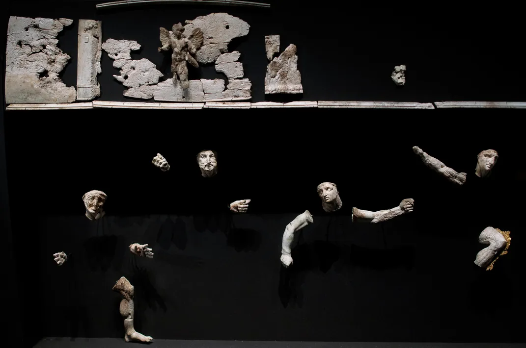 Fragments of a frieze, discovered inside Philip’s tomb, included ivory figurines. Second from left, an arresting likeness of Philip. Far right, Alexander.