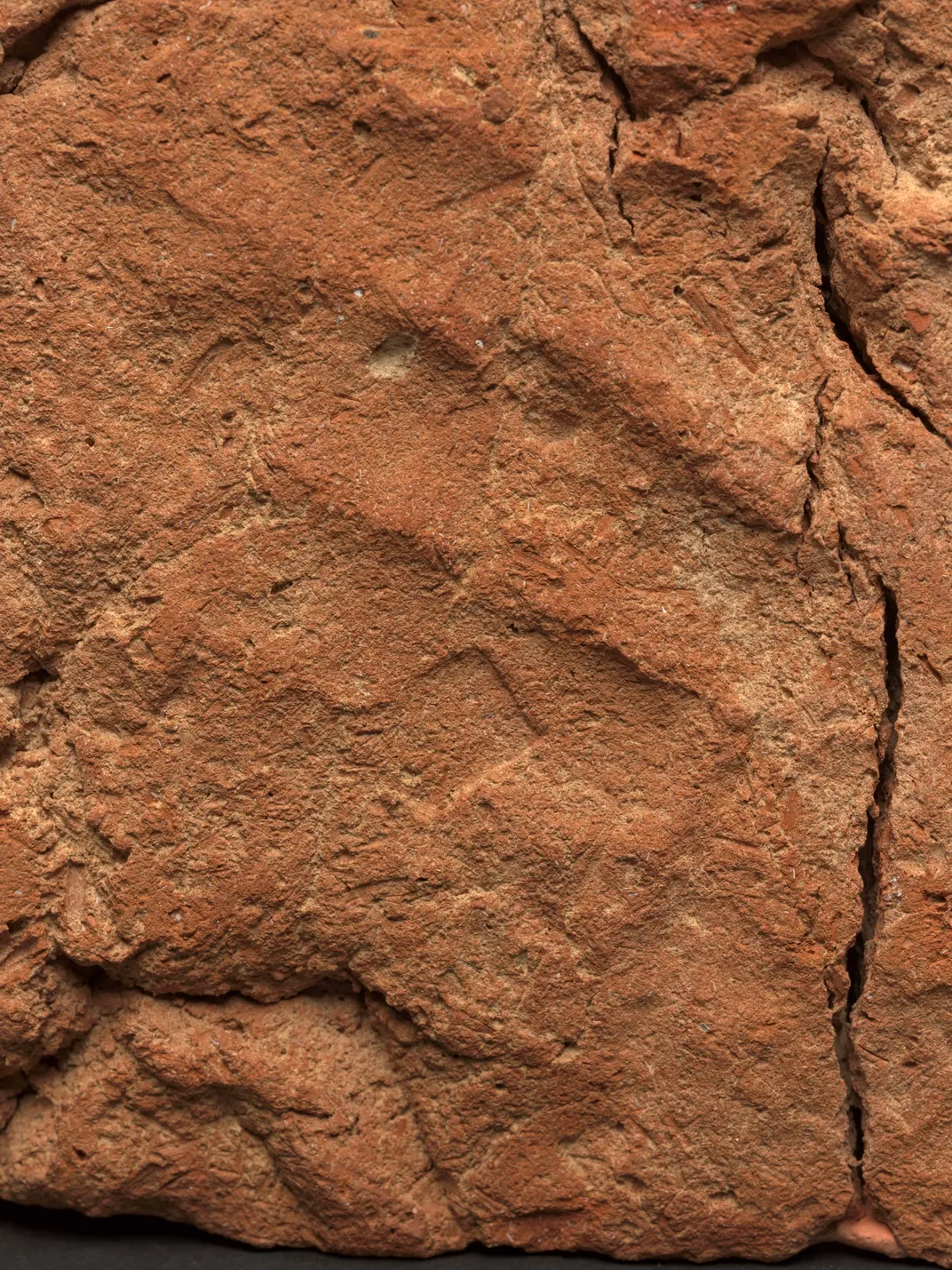 close-up of a handprint found at the bottom of a 'soul house,' dating to around 2055–1650 B.C.E.