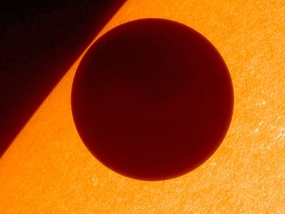 Venus crossing the disk of the sun in 2012, as seen by the Japanese Hinode satellite.