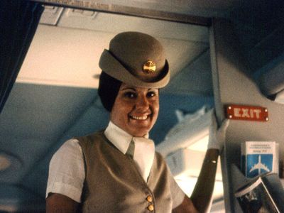 Sorry about the delay, folks. A Pan Am flight attendant circa 1970.