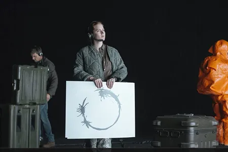 Amy Adams tries to figure out how to talk to the aliens in the 2016 film Arrival.  