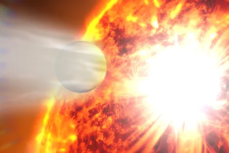 An artist&rsquo;s depiction of HD 189733b encountering an eruption of x-rays from the star it&rsquo;s orbiting