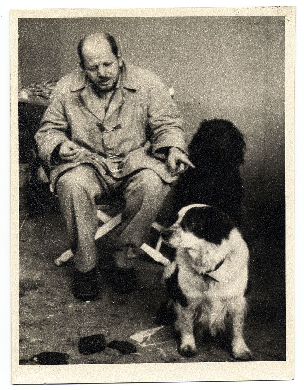 Photograph of Jackson Pollock with his pet dogs Gyp and Ahab