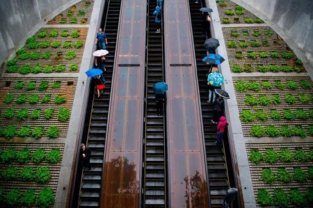 Commuters ride up escalators at the Dupont Circle Metro Station in Washington, D.C.