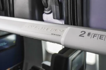 Braille signage will be added to rows and individual seats, as well as lavatories.