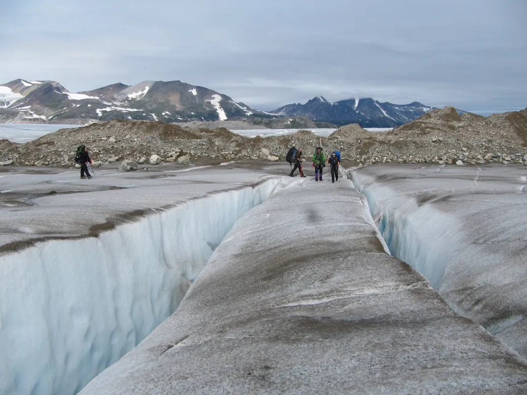 Researchers walk near crevasses on the Juneau Icefield in northern British Columbia.