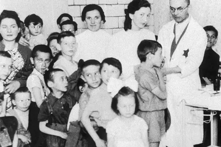 Jewish doctors give medical examinations in the Warsaw Ghetto