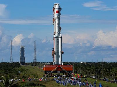 The new Long March 7 rocket makes its way to the launch pad at Wenchang.