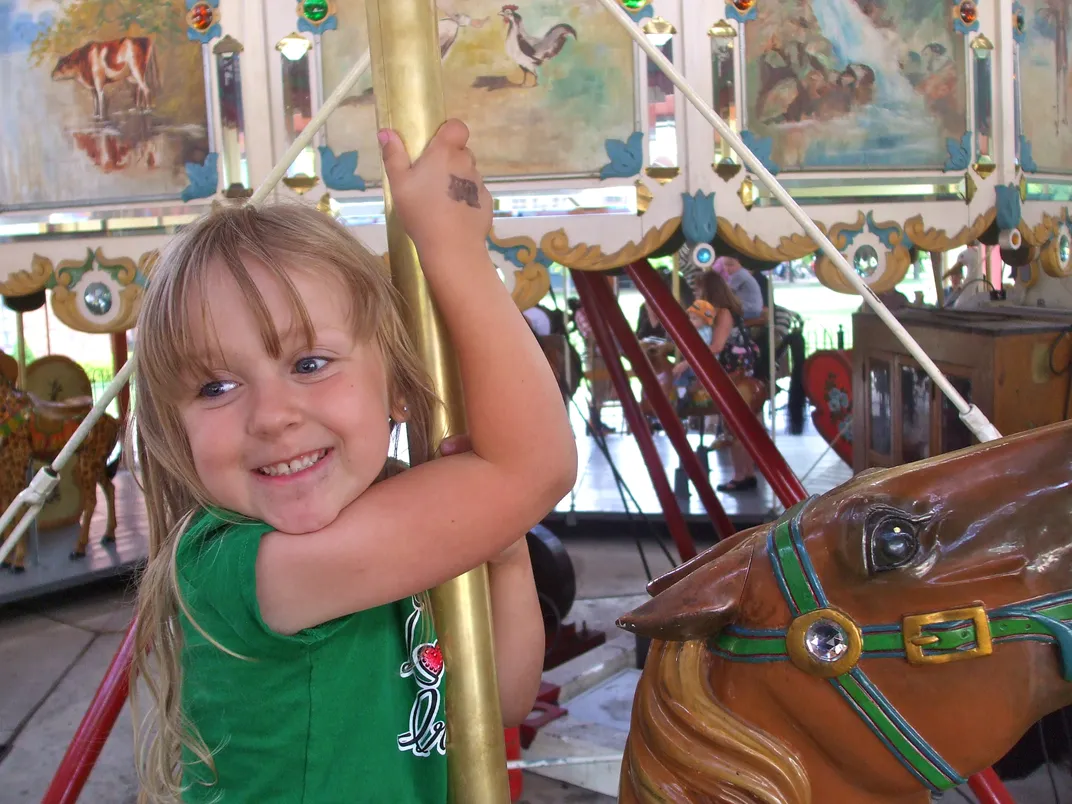 Lillian riding the carousel at Greenfield Village. | Smithsonian Photo ...