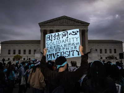 Protesters attend a rally in support of affirmative action in college admissions on October 31, 2022.