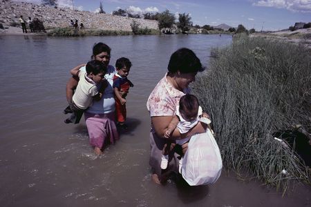 Mexican emigrants crossing the Rio Grande near El Paso, Texas.