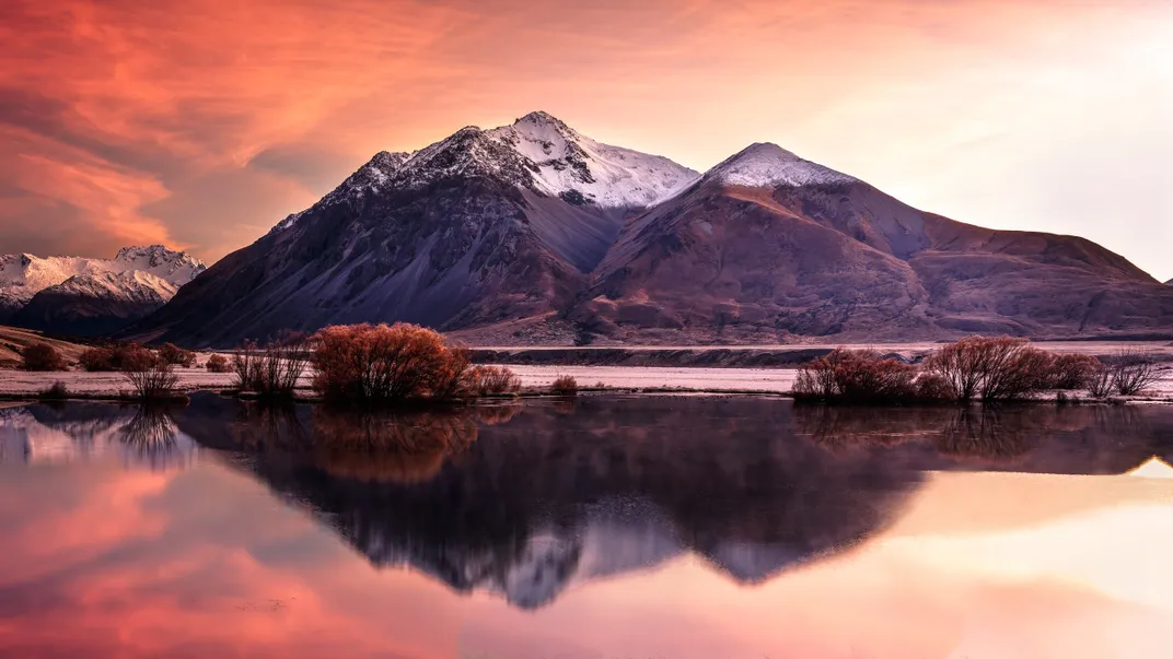 An image of mountains against a sunset in South Island, New Zealand