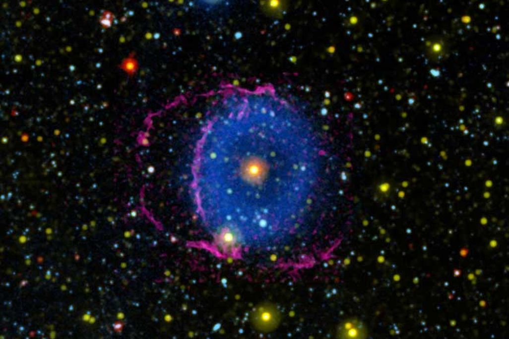 A photo of the blue ring nebula in space 