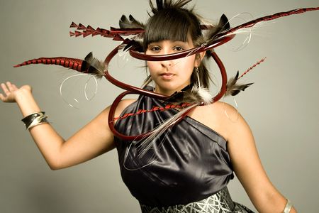 Postmodern Boa by David Gaussoin and Wayne Nez Gaussoin (Diné [Navajo]) and Picuris Pueblo, 2009, stainless steel, sterling silver, enamel paint and feathers 