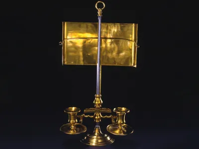 George Washington used the light of this brass candle stand while laboring over his farewell address in 1796.