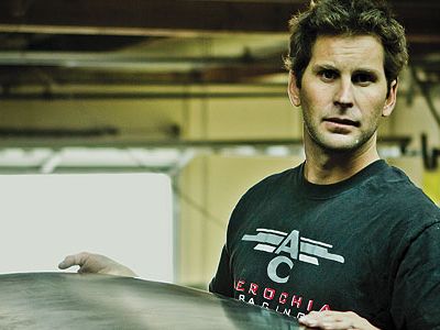 Andy Chiavetta inspects a new carbonfiber wing for his LT-1 kitplane at his shop in San Clemente, California.