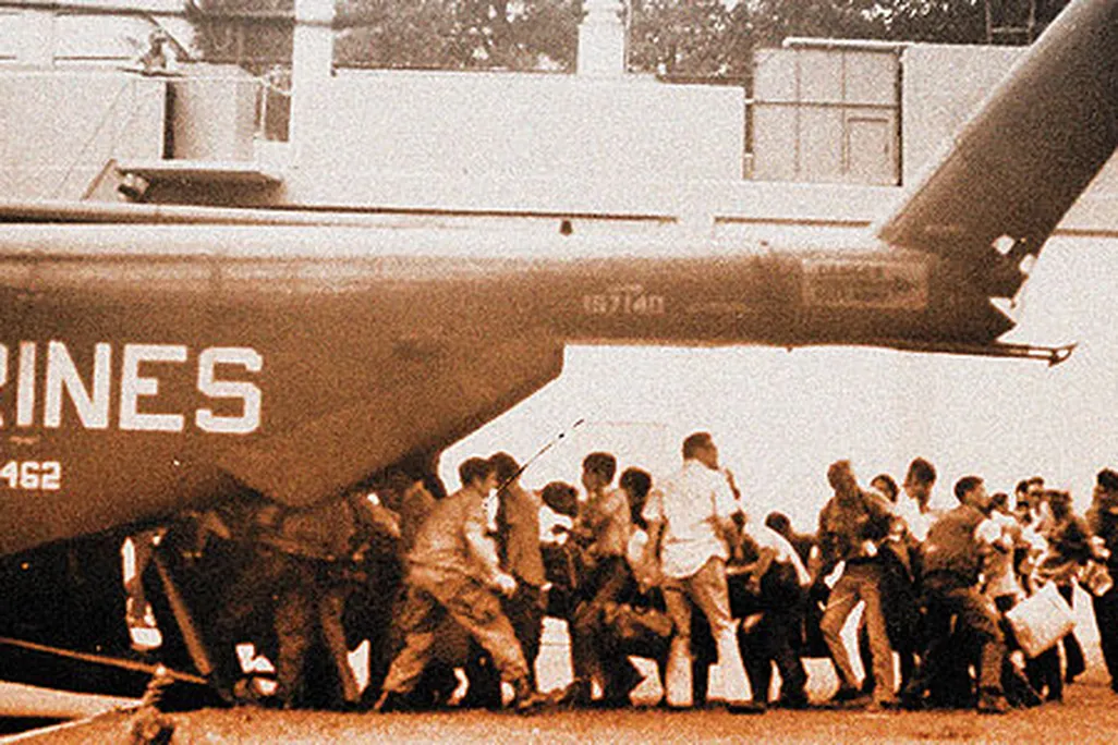 During the United States’ final 24 hours in Vietnam, American nationals and Vietnamese refugees were crowded onto Marine and Air Force helicopters that landed within the U.S. embassy compound.
