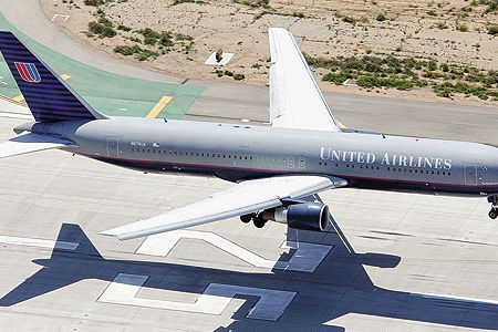 A Boeing 767-300 lands on Los Angeles International Airport’s runway 25L.