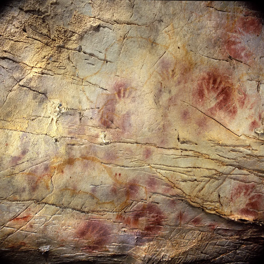 hand art in a cave