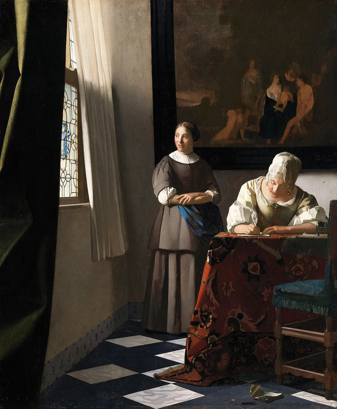 Johannes Vermeer's Woman Writing a Letter With Her Maid