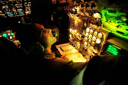 Flight engineer Tech. Sgt. Bo Sullivan, a crew member with the 7th Expeditionary Air Combat and Control Squadron, prepares to take off on a JSTARS mission over Iraq.