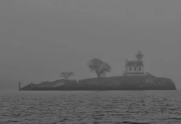 View of Pomham Rocks Lighthouse in Rhode Island from a rower's perspective thumbnail