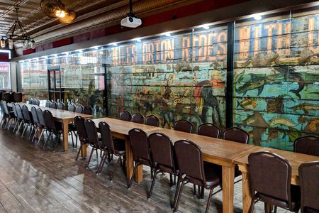 The134-year-old circus advertisement was crafted using lithograph, a material meant to degrade over time. After uncovering it in the Corral Bar and Riverside Grill, the family who owns the establishment restored and encased in glass.