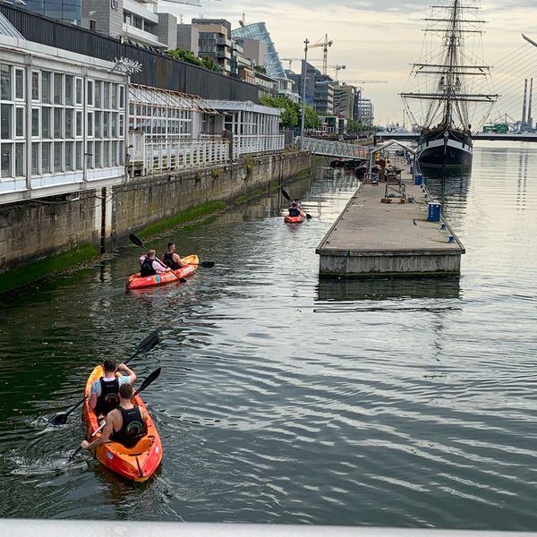 Kayakers on the River Liffey in Dublin Ireland thumbnail