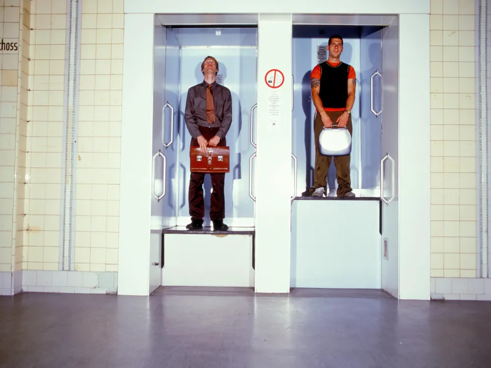 paternoster elevator with two people