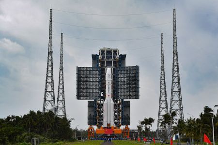 A Long March rocket sits ready on the pad at China's Wenchang spaceport to launch the country's next moon lander.